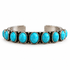 Bracelet jonc mixte réglable en pierres turquoise, vue de face sur fond blanc